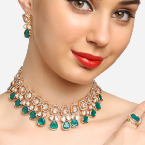 Gold Plated Kundan Stone Studded Necklace With Earrings & Ring